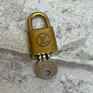 VINTAGE LOUIS VUITTON Brass Lock Numbered with Matching‎ Number Key Set